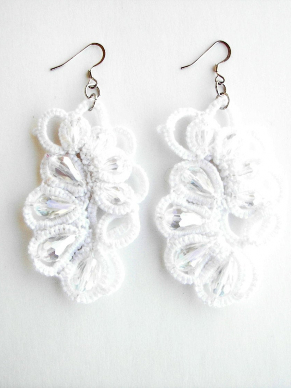 Sunlight on the Snow Ankars Style Tatted Drop Earring White tatted earrings with crystal drops on white backdrop