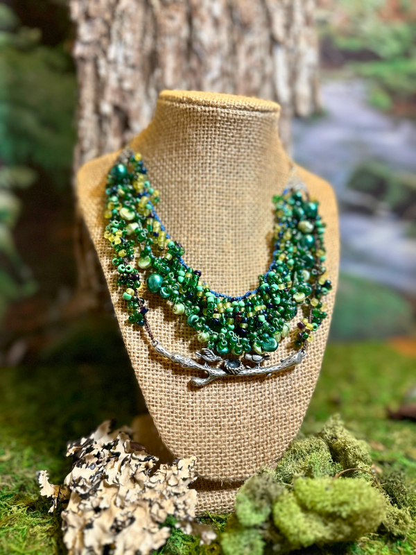 Three-strand tatted woodland necklace in brown, green, and blue hues Three-strand forest-themed necklace in earthy and blue tones