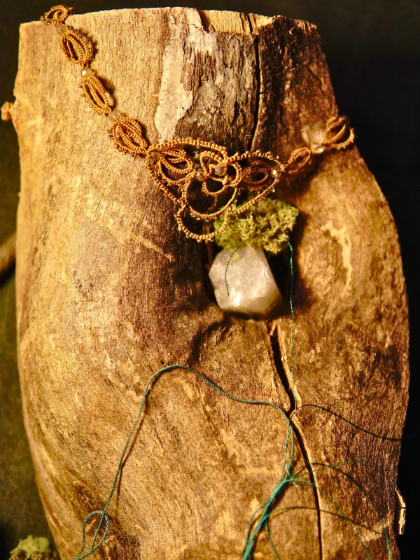 Woodland necklace honoring the pulse of the forest Nature-inspired lace necklace in warm earth tones