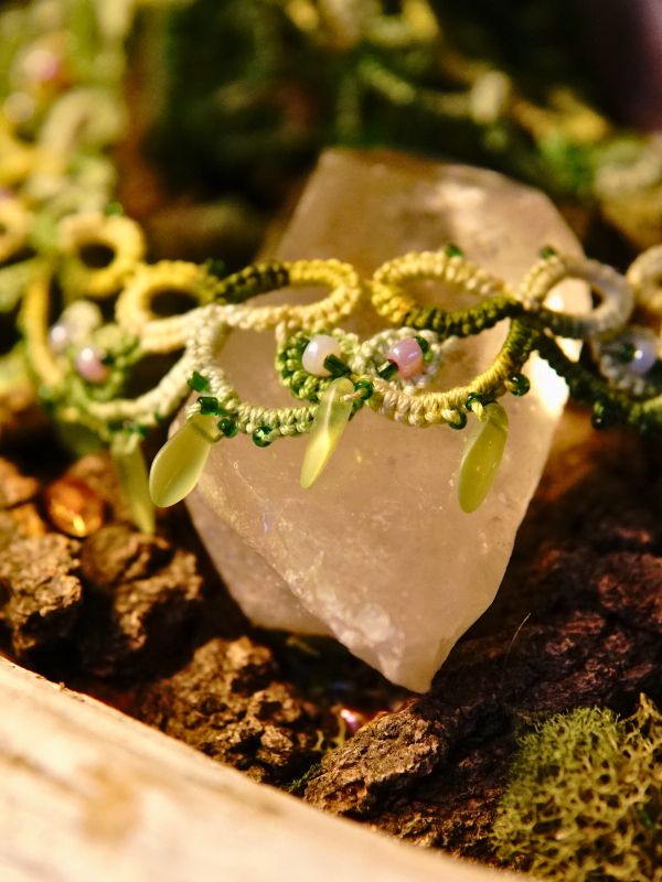 Spring Has Sprung green tatted lace necklace and earrings set Green lace earrings with frosted beads on crystal display