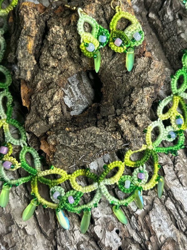 Spring Has Sprung green tatted lace necklace and earrings set Botanical green necklace and earrings displayed on wood