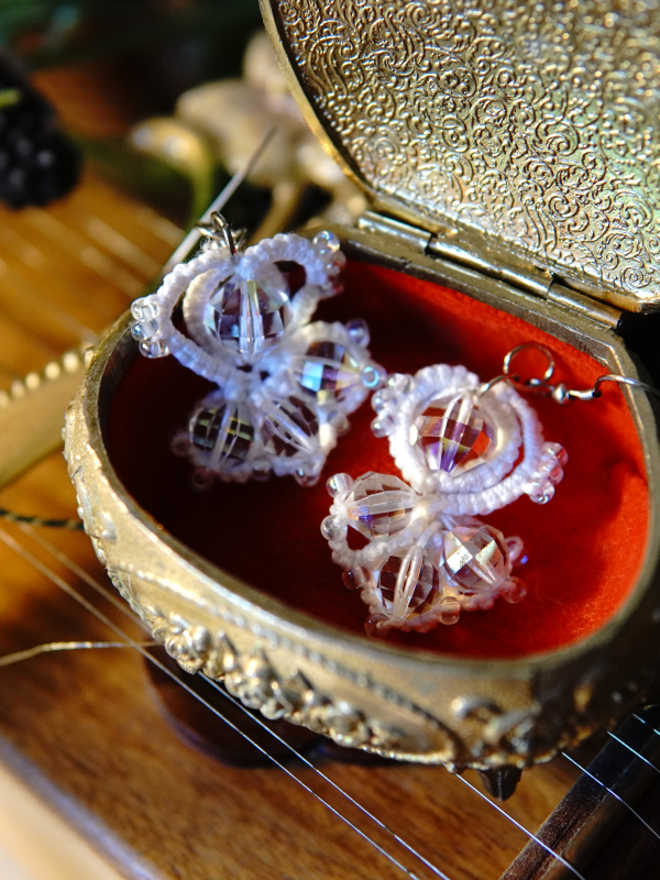 Crystalfathom Earrings – white lace and vintage Swarovski Close-up of Crystalfathom’s crystal-detailed tatting