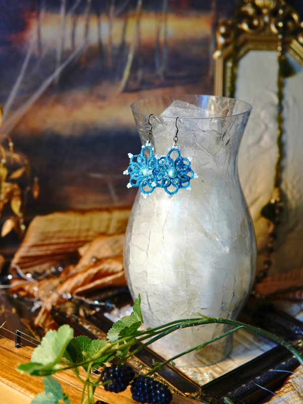 Duchess Drops aqua Ankars earrings with pearls Elven backdrop showing Duchess Drops earrings.