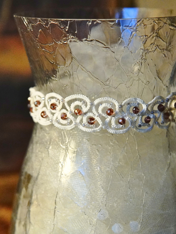 Elarian Bloom Necklace with crystals Detailed shot of white lace loops and beadwork.