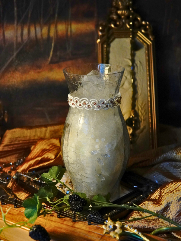 Elarian Bloom Necklace with crystals Tatted choker with crystals shown in warm forest staging.