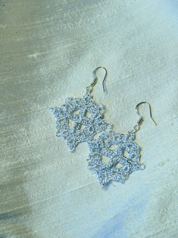 Gilded Echoes tatted metallic lace earrings in elven style Silver metallic lace earrings with delicate tatted pattern.