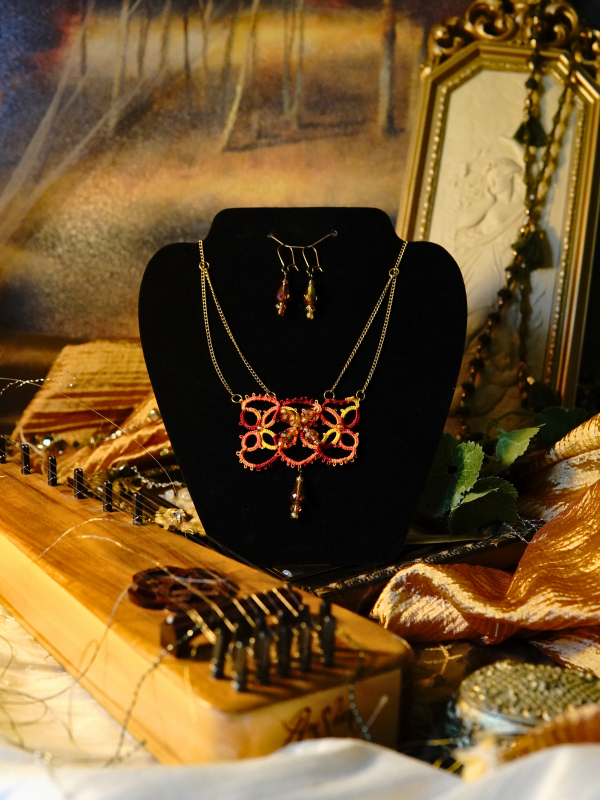 The Gilded Emberleaf tatted necklace in rust and gold Lace motif necklace with copper-toned crystals