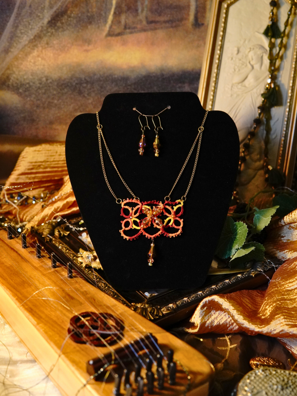 The Gilded Emberleaf tatted necklace in rust and gold Rust and gold tatting with crystal drop bead centerpiece