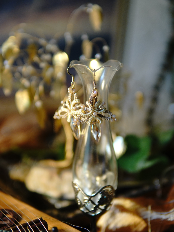 Gold lace earrings with faceted crystal teardrops