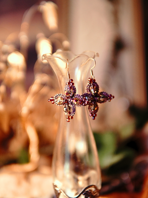 Starweft Blossom tatted lace earrings in pink and crystal Pink and plum lace earrings hanging from gold hooks.