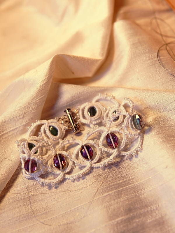 Whisperbind Bracelet – White Tatted Lace with Aurora Borealis Crystals Tatted bracelet with shimmering AB crystals