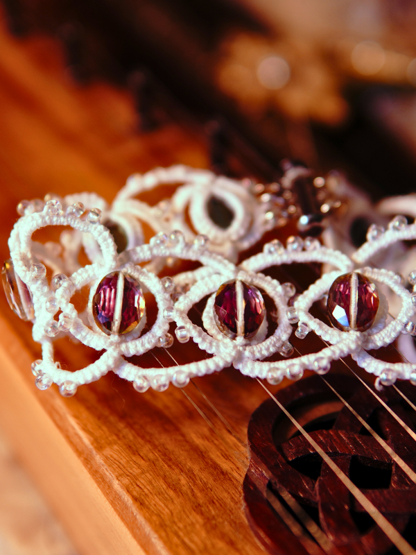 Whisperbind Bracelet – White Tatted Lace with Aurora Borealis Crystals White lace bracelet with faceted stones