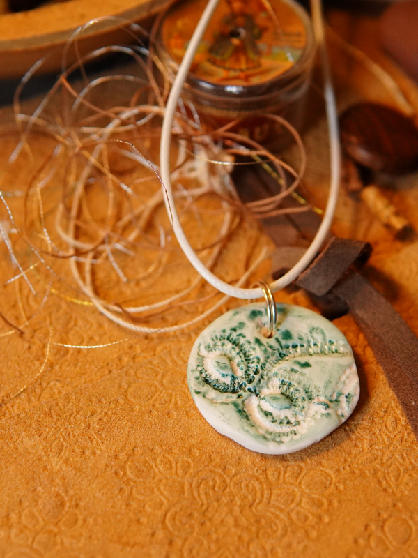 Large round artisan pendant