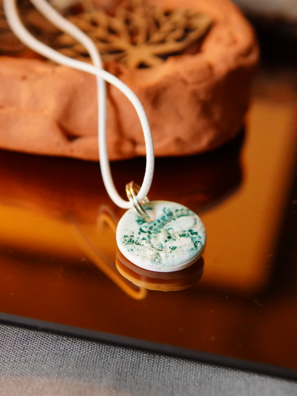 Lace impression in alabaster clay