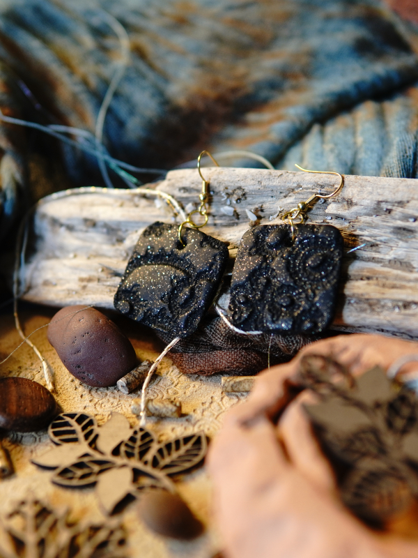 Textured black clay statement earrings