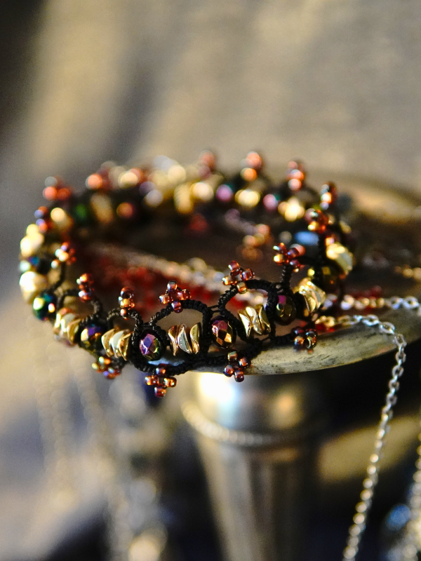 Crown of the Unspoken worn for silent strength Dark lace circlet with purple thread and beadwork