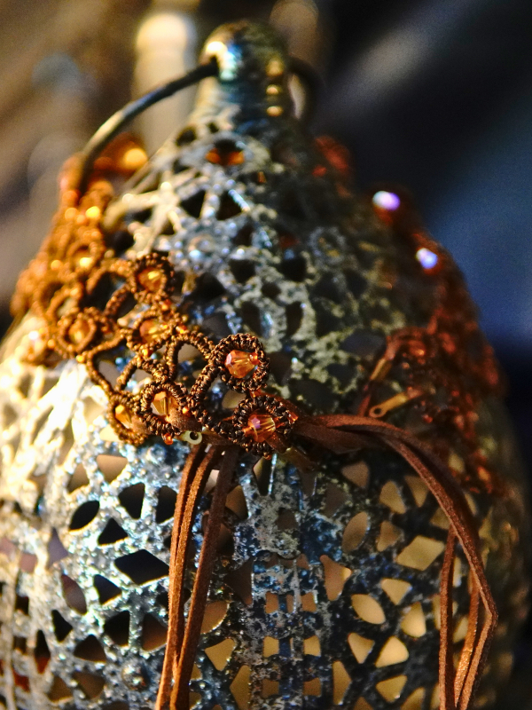 Emberbind necklace with fire-amber beadwork and leather ties Copper tatted lace necklace with glowing amber beads