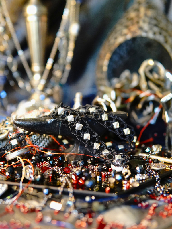 Ironveil Oath—midnight lace and silvered resolve Black lace choker with metallic accents