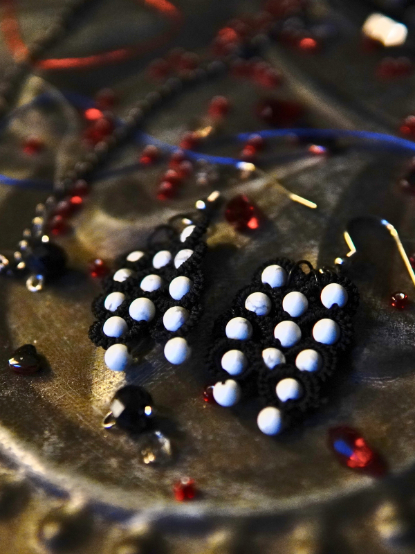 Oathforged shadow-themed earrings Side view of Shadowguard earrings