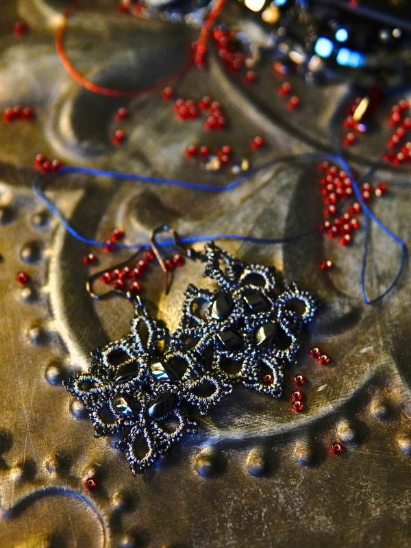 Steelwoven Grace earrings in storm-grey lace Hematite-set lace earrings displayed