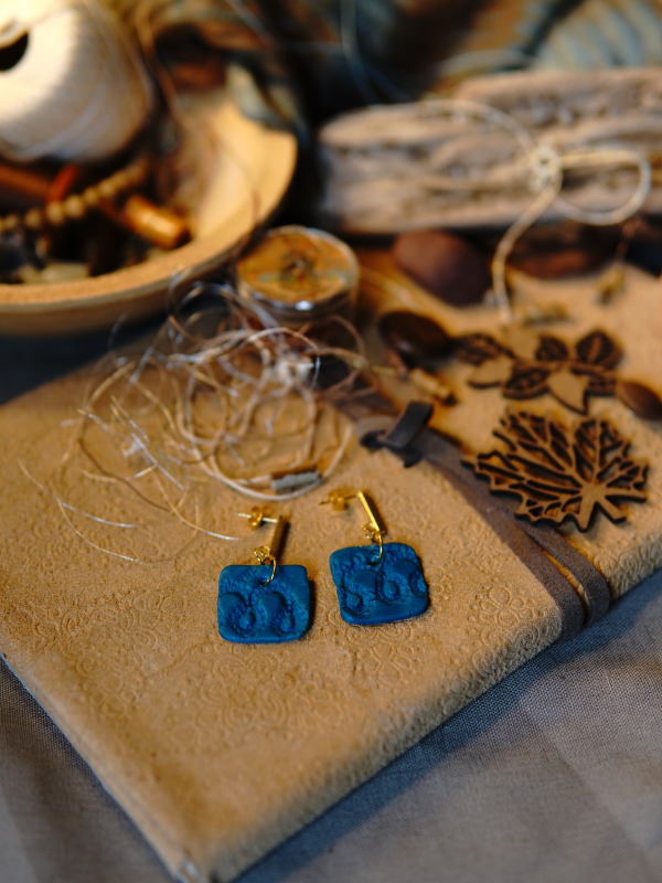 Square artisan earrings with gold bar posts. Gold finish stainless post earrings