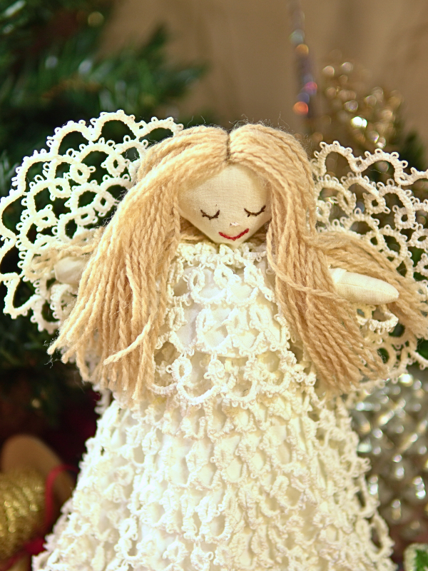 White tatted lace angel tree topper with a full handmade lace gown