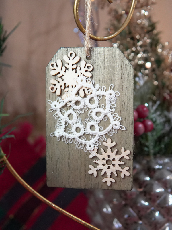 Handmade snowflake tag ornament – unique design White tatted snowflake ornament on wood tag