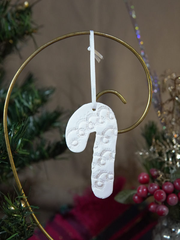 Candy Cane: White pearlescent candy cane ornament with lace imprint