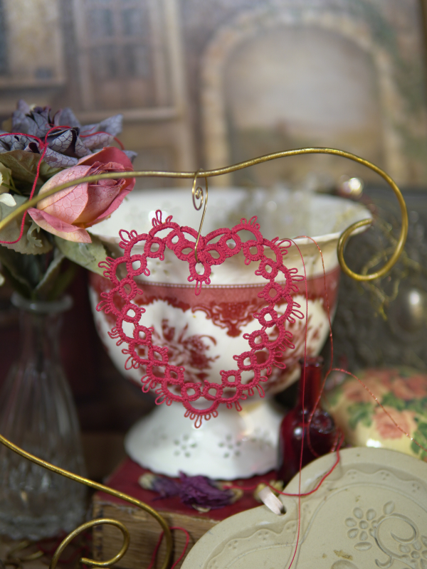 Needle-tatted large red heart with ringed edging