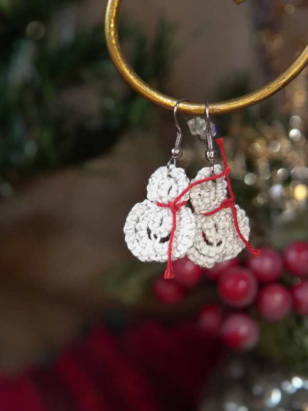 White lace snowman earrings tied with red thread scarves