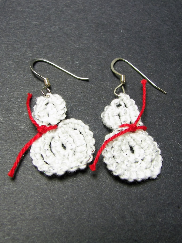 Detailed white tatted snowman earrings with red scarf accents