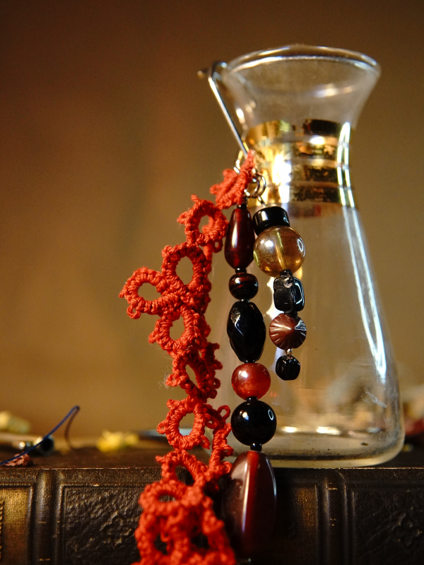 Crimson Gemfall Keychain Gemstone and red lace keychain styled on vintage book