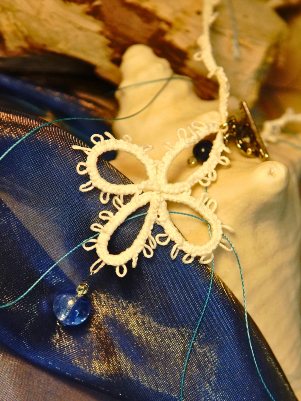 Tidecross Blessing - Close-up Detail of Pendant Artisan lace cross pendant symbolizying sea prayers and tides.