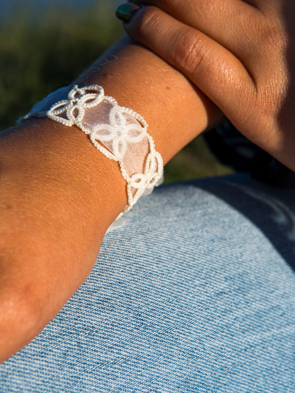 White fiber jewelry bracelet Petalbound in traditional tatting style