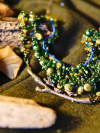 Woodland statement necklace with layered strands and nest detail