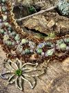 Earthy brown lace necklace with green stones and crystal sparkle