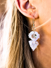 Crystalfathom earrings glowing with crystal shimmer