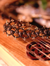 Brown tatted lace bracelet with golden shimmer