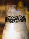 Black tatted choker showing intricate loop pattern
