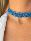 Close-up of Alaria choker with deep blue beads
