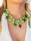 Close-up of tatted leaves and green beads on Seralith necklace