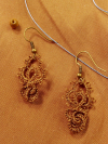Celtic-inspired earrings with looped lace patterns
