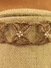 Side view of the choker showing detailed threadwork.