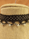 Black lace tatted on polka-dotted black grosgrain ribbon choker.