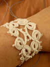 Model wearing Driftspine Tatted Lace Bracelet