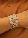 Model wearing Mistveil Tatted Lace Bracelet