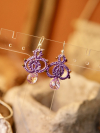Bloomdrop earrings with shimmering crystal accent.