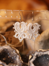 Boho tatted lace earrings with delicate feather-like curves.