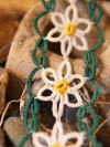 Nature-inspired bracelet hand-tatted in sunny daisy hues