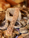 Emberclay tatted lace bracelet on bohemian backdrop with crystals and cement